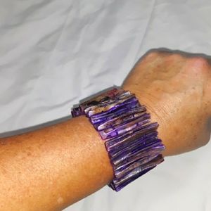 Multicolored purple with tan bracelet.